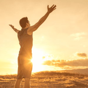 A man standing in sunlight.